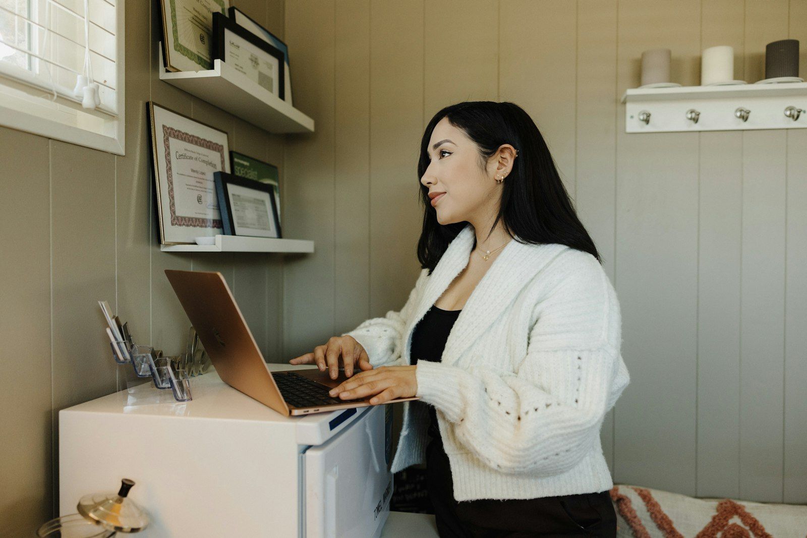 Business owner working at a laptop
