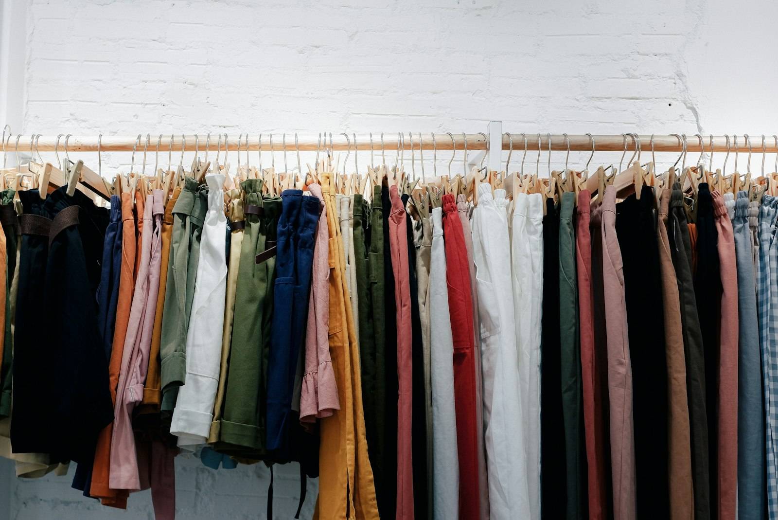 Rack of colorful vintage clothes