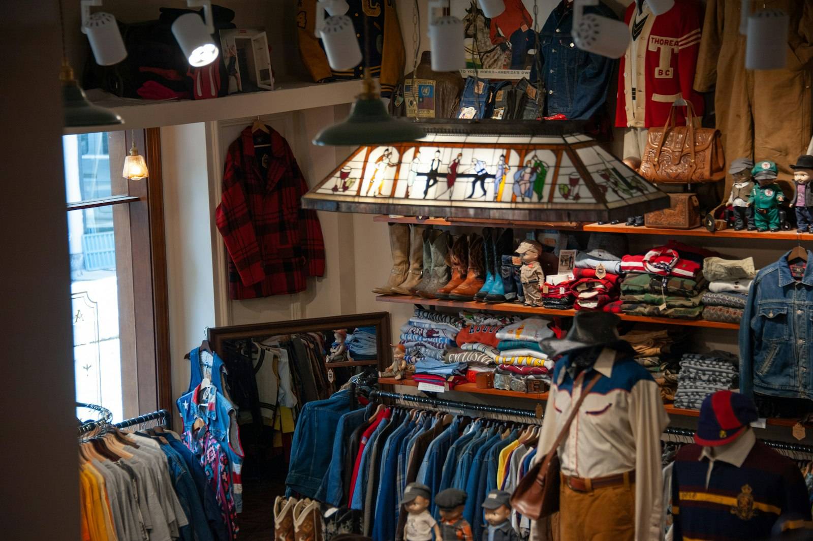 Vintage store interior with shirts and lamps