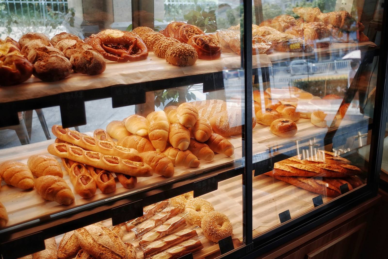 Display case of fresh breads and pastries