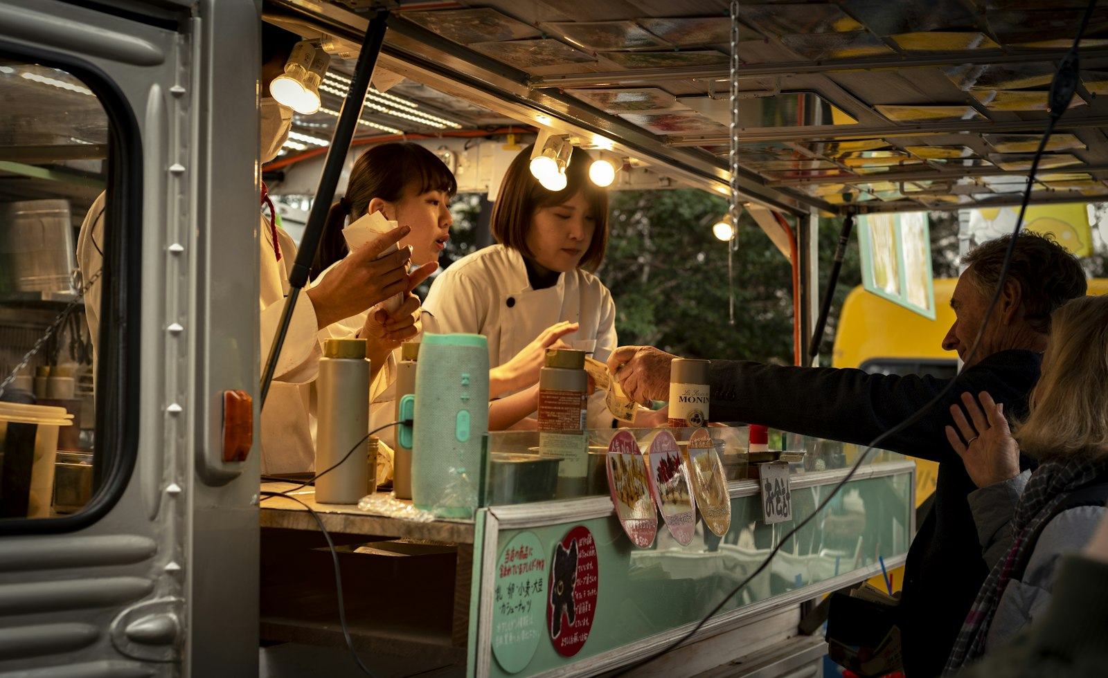 Guests ordering at a food truck window