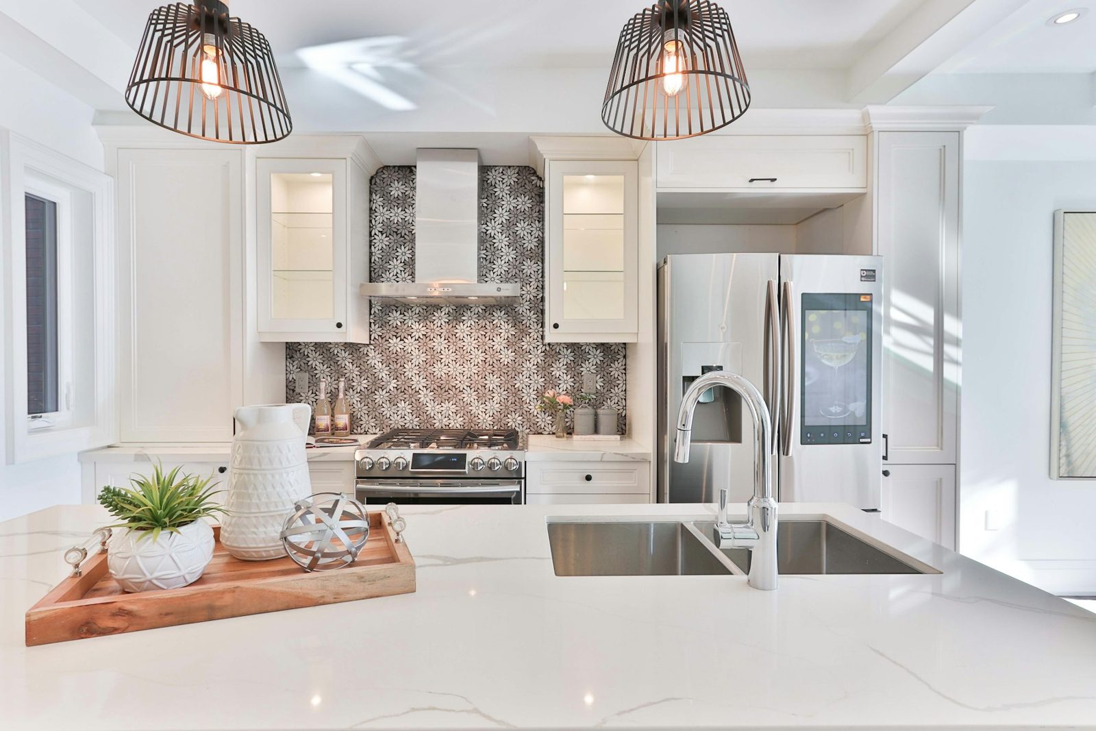 Spotless kitchen with marble island