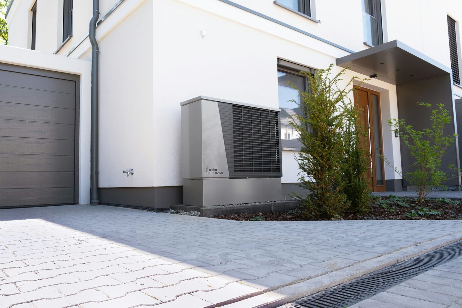 Heat pump installed beside a modern home