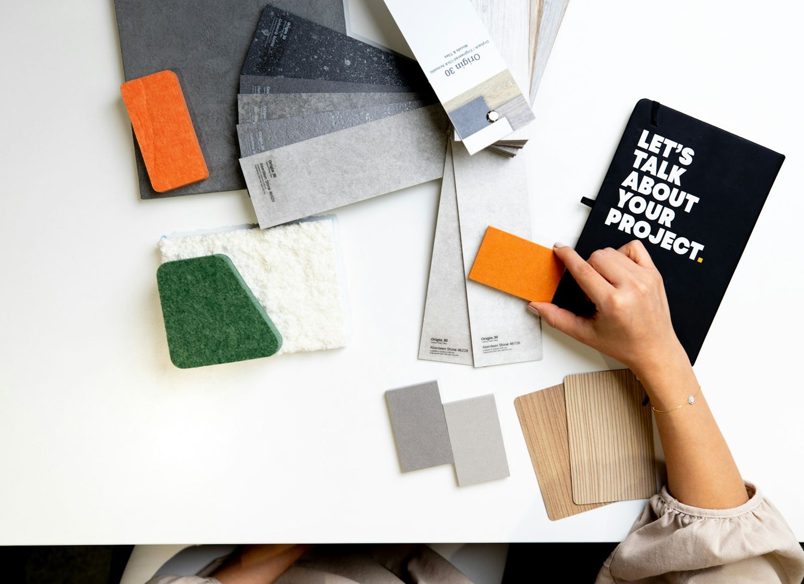 Designer selecting material samples
