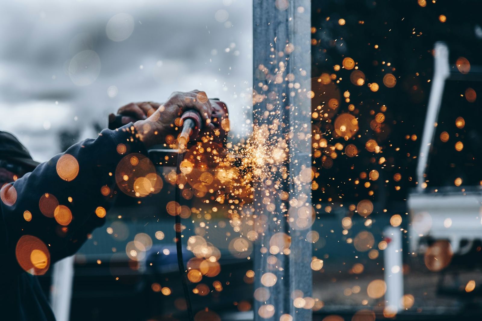 Sparks around a steel post