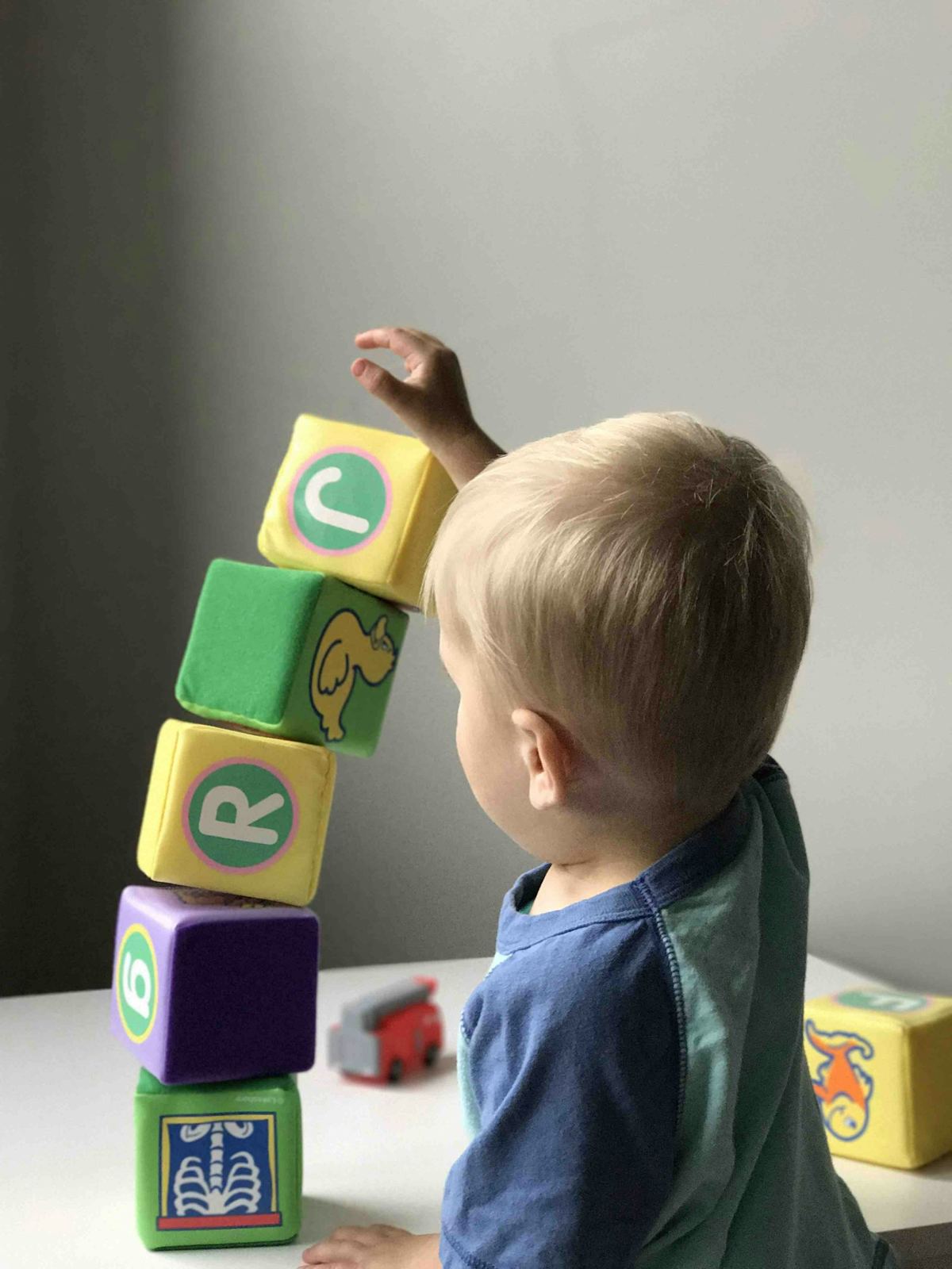 Toddler stacking letter blocks