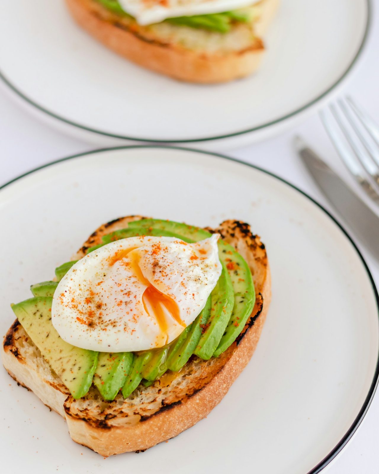 Toast with avocado and a poached egg
