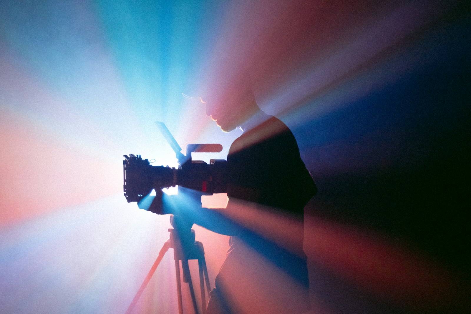 Camera silhouette in colored light