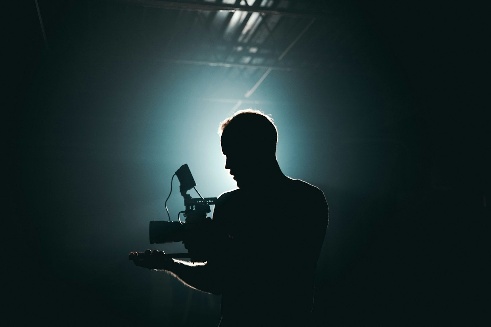 Camera operator in silhouette