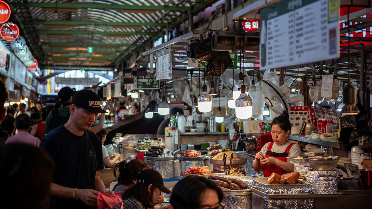 Market hall with hanging lamps and stalls