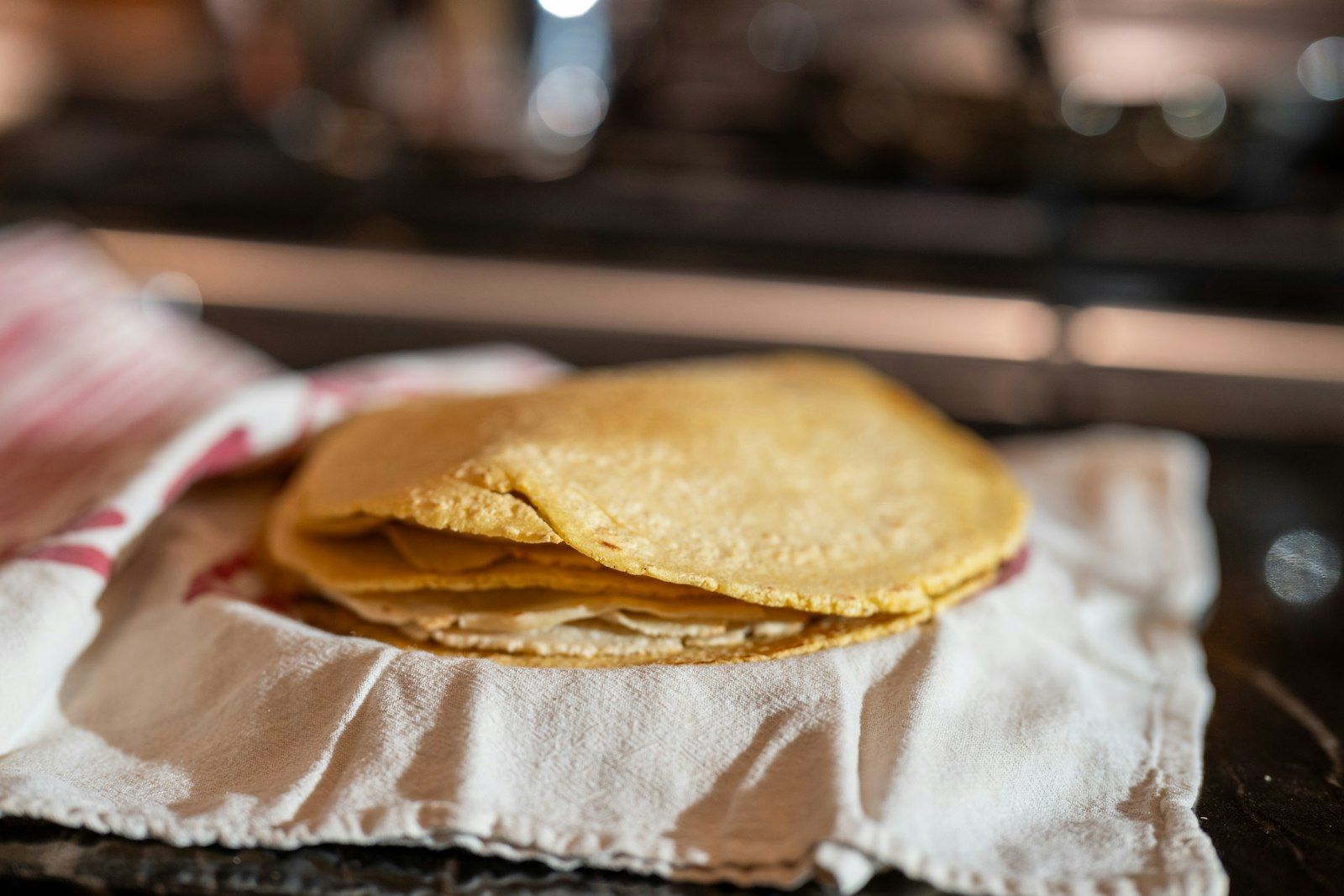 Warm tortillas wrapped in cloth