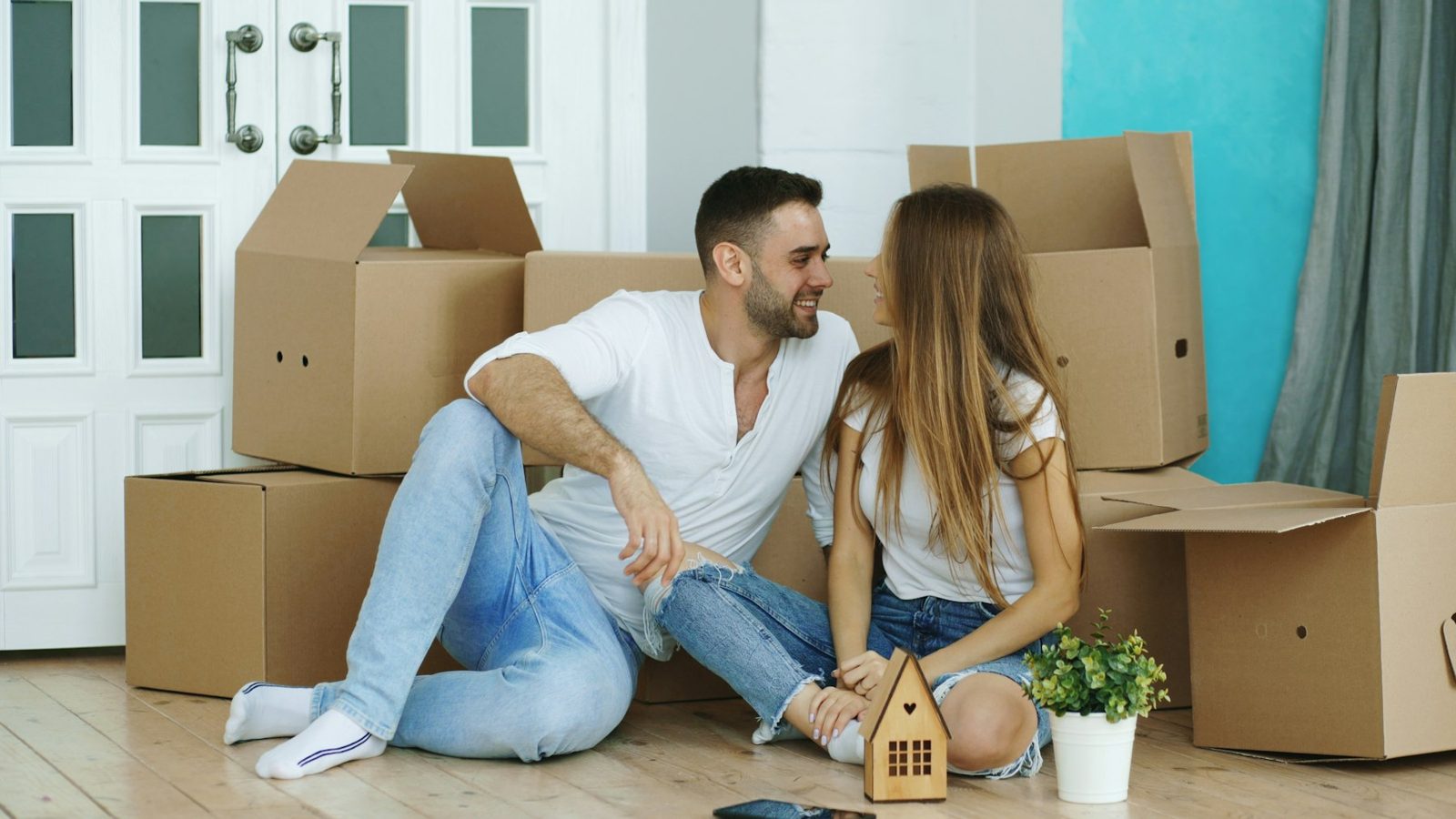 Couple unpacking in a new home