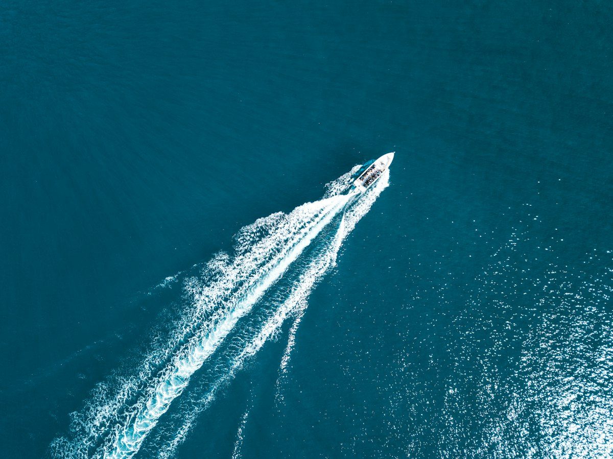 White speedboat on the ocean