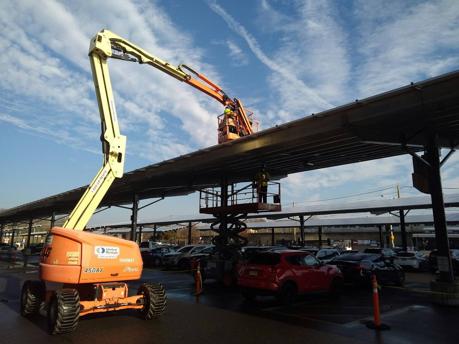 Articulating boom lift on a job site