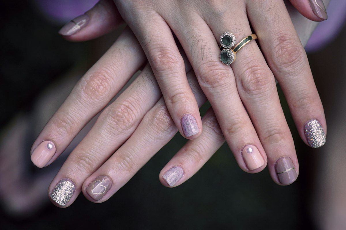 Woman with manicure and ring