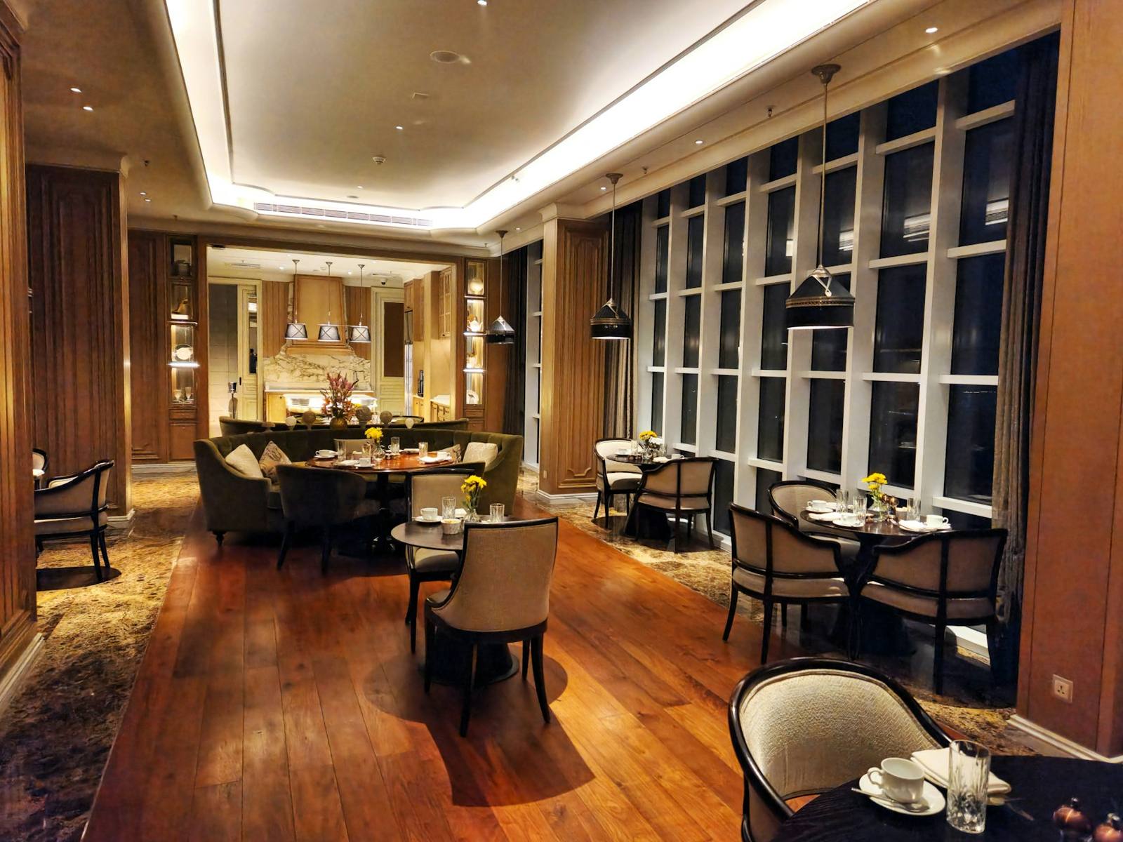 The dining room lit warmly for dinner