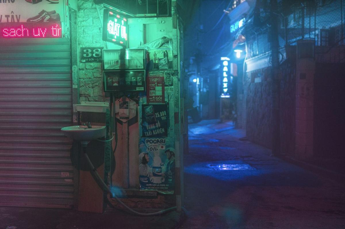 Neon-lit alley at night