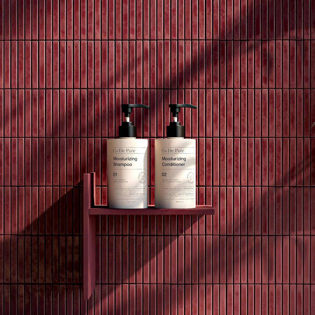 Two pump bottles of shampoo and conditioner on a shelf against red tiles